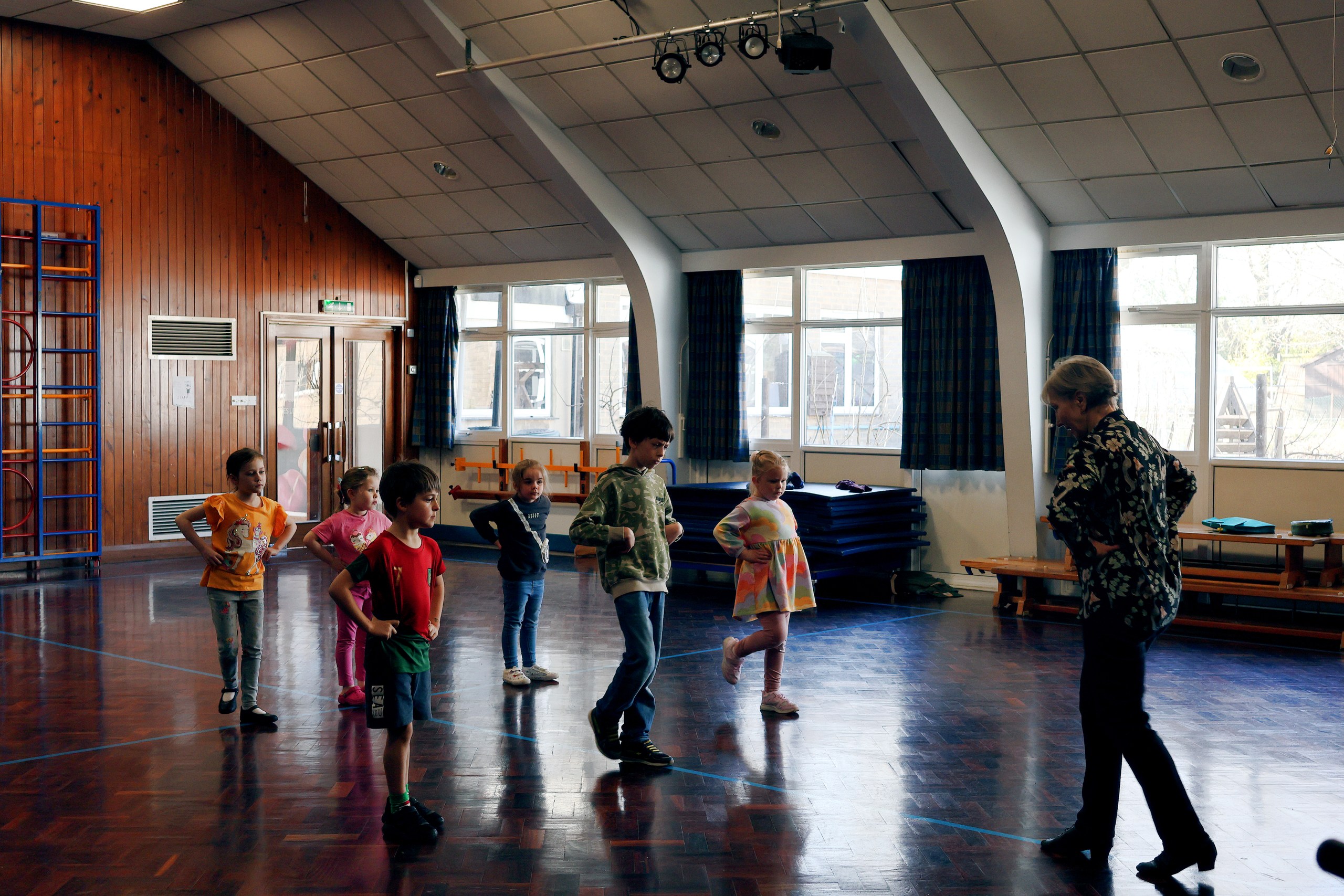 How does ballroom dancing benefit children?